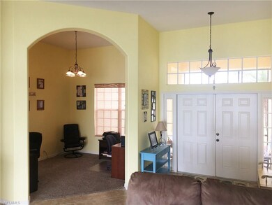 Entry and office/den or dining room