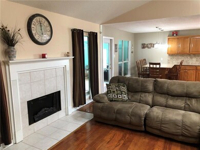 Cozy & warm natural gas fireplace. Living is open