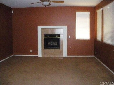Family room of the kitchen with cozy fireplace & v