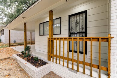 Doorway to property with a porch