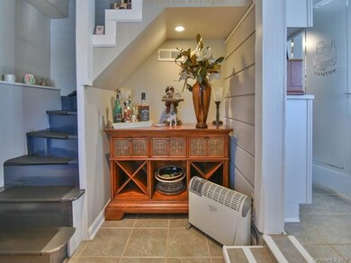 Stairs Leading to Lower Level Showing Bar Area and