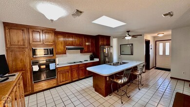Large Custom Wood Cabinets for Ample Storage  Great for Entertaining Preparation
