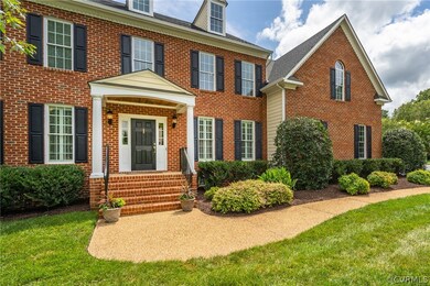 Brick front complemented by Hardi-plank siding pro