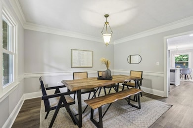 Formal Dining Room is a Light-Filled space perfect for gathering and making memories.