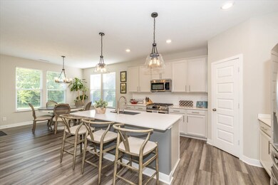 Spacious kitchen features newer LG appliances.