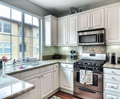 Bright, open and pretty. This kitchen has an abund