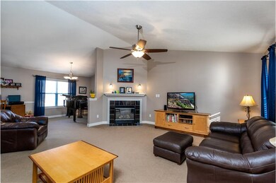 This open floor plan floods with natural light from the large windows.  The dining room makes a great flex space to fit your needs.