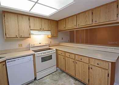 New dishwasher, range hood, and new hardware on th