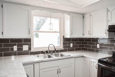 Tile backsplash in the kitchen.