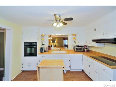 Large open kitchen overlooking the family room fea