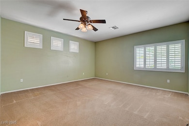 Spacious Master Bedroom features ceiling fan, shut