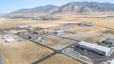 Aerial view of an industrial area and a mountain backdrop