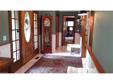 SPACIOUS/BRIGHT FOYER WITH MARBLE FLOOR AND ANTIQUE SOLID OAK DOOR