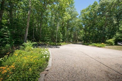 The large gravel driveway offers...
