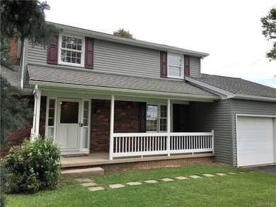 Home includes a front porch, side porch and a back