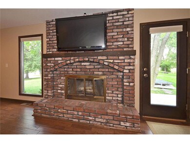 Gas start, wood burning fireplace. TV also stays with home.