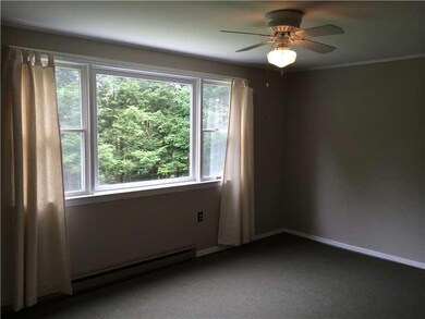 Master Bedroom. Large window in...