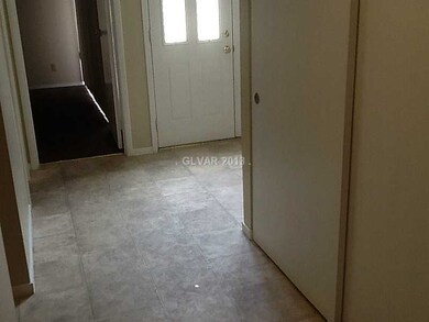 Property Photo. Inside view to the main entrance.