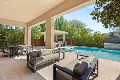 Covered patio, pool/spa and covered outdoor kitchen