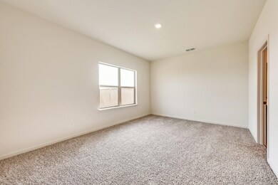 Unfurnished room with light carpet and recessed lighting