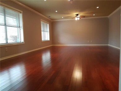 The large front living room is freshly painted wit