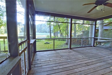 screened porch with water/ golf course view