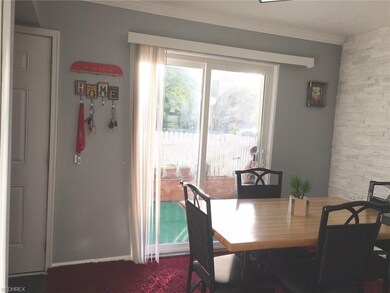 Dining room overlooks the rear patio.