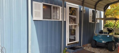 Door to detached Pole Barn/Garage/Studio Apartment