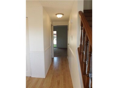 Foyer. looking down the hallway from the front doo