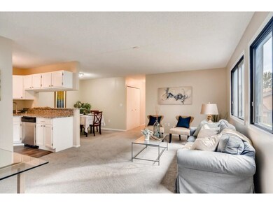 ...opens to dining and kitchen...