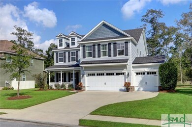Sidewalk, curb & gutter.  Fully sodded yard.  Blue