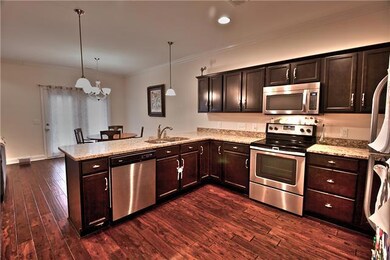 Great kitchen with granite and stainless steel appliances. Kitchen overlooks an eatin area as well as the living room.