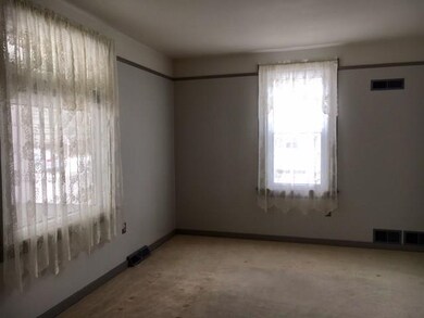 Living Room with Large Front Window and Side Windo