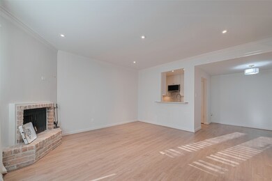 Living Room with natural lighting and  fireplace