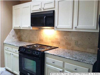 GREAT KITCHERN W/ GRANITE, TRAVERTINE BACKSPLASH, 