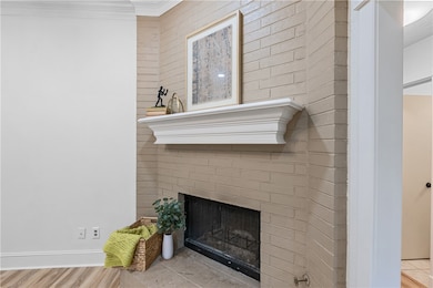 Detailed view of a brick fireplace, ornamental mol