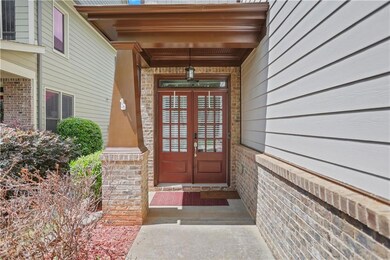 View of exterior entry featuring french doors and 