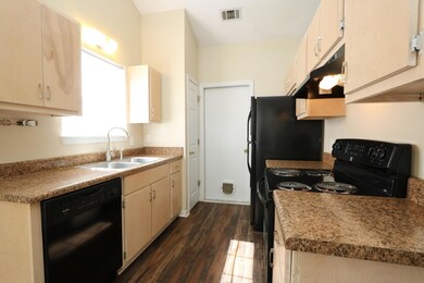 Kitchen view with sink and pantry