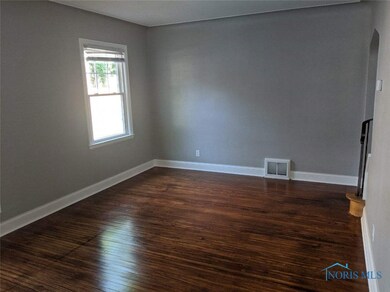Living room with new paint, trim, newly finished h