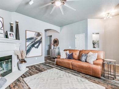 Living room with vinyl plank flooring.