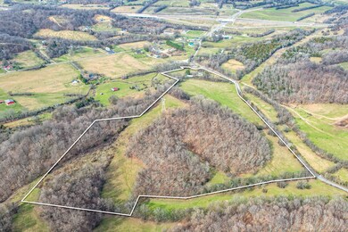 Rolling farmland with over 2,000  ft of road frontage.