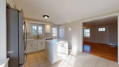 Unit A - View from Kitchen into living room.