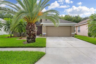 A paved walkway directs you to the front entrance.
