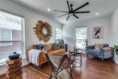 Living room featuring dark hardwood / wood-style f