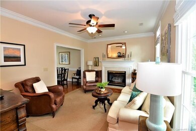 Great room with gas log fireplace.