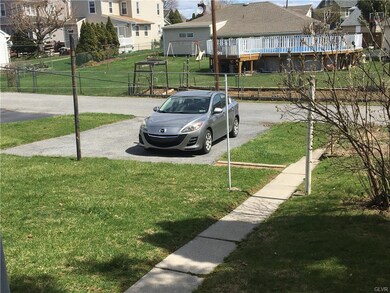 Two car parking area serviced by rear alley.