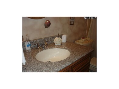 Newly remodeled baths with granite counter tops.