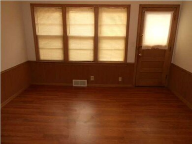 DEN OR OFFICE WITH FRENCH DOORS FROM THE HALL WAY