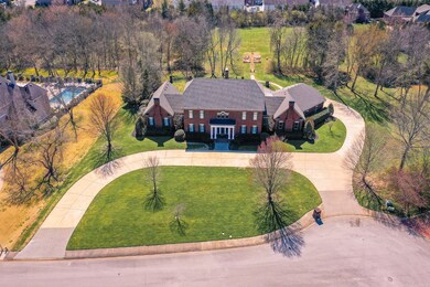 Nestled on a quiet cul-de-sac, the all brick estate sits on 3.12 acres of lush, level land. From its circular front drive to its sprawling, tree-lined backyard, this property invites you to settle in, spread out, and live your best life. 
