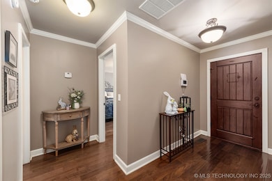 Foyer featuring beautiful engineered hardwood floo